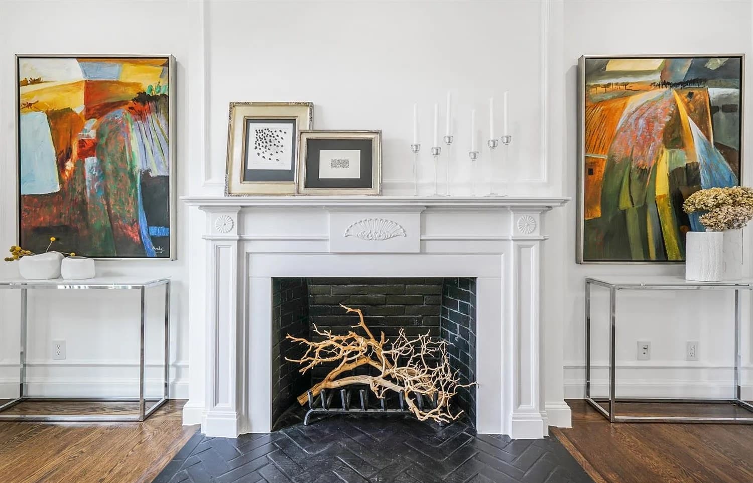 Fireplace with a restored mantel and herringbone hearth
